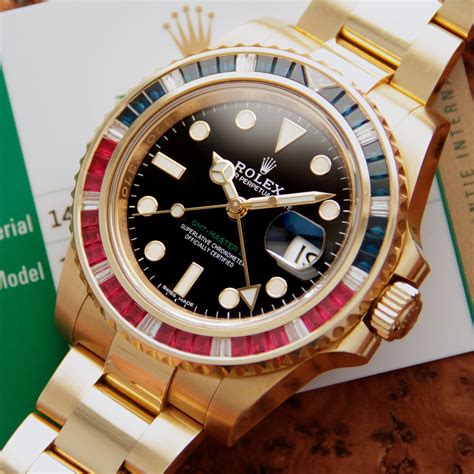 Vendesi Rolex GMT Master II 116748SARU, 18K Yellow Gold, 